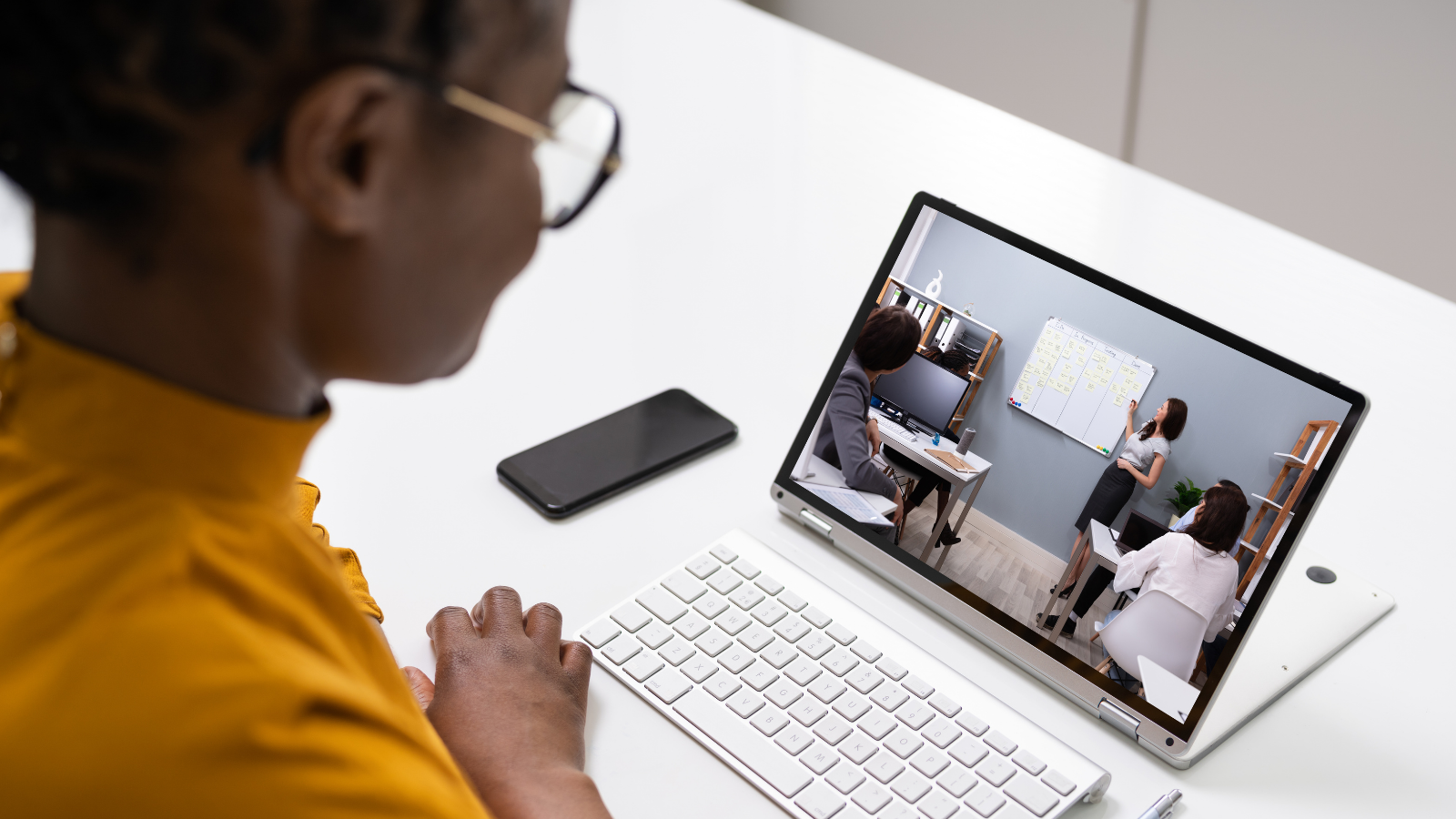 Woman watching presentation online